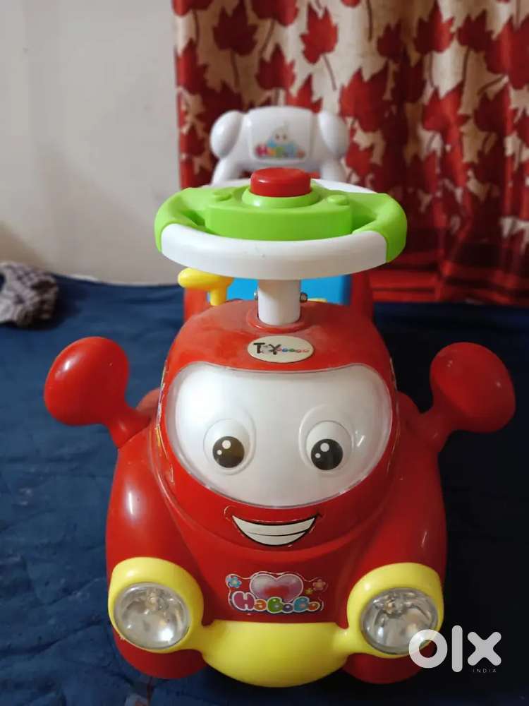 Its a kids toy ride car with dicky. Its eyes are blink,  horon there