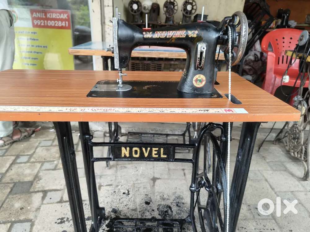 Novel sewing machine half steel