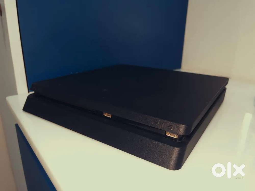 PS4 Black (1TB model, original power cable) WITH FIFA 20