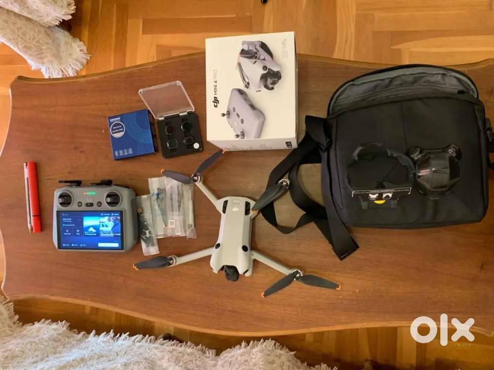 DJI Mini 4 Pro Fly More Combo Camera Drone (with RC 2 Remote)