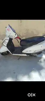 White colour. Honda activa good condition