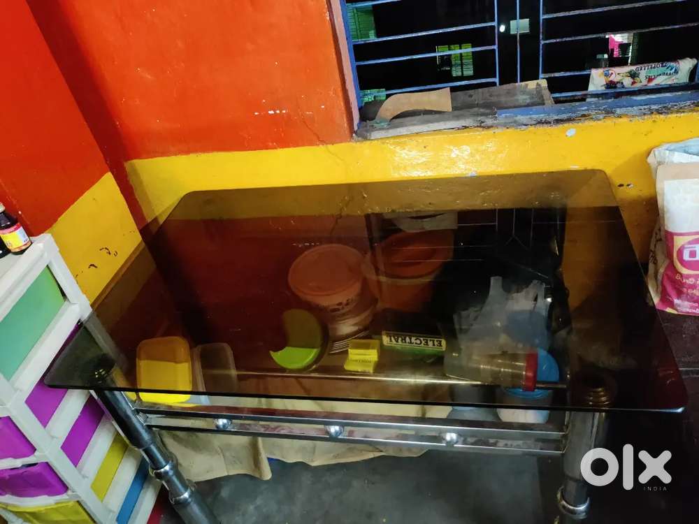 Glass dining table with 4 chair in steel frame