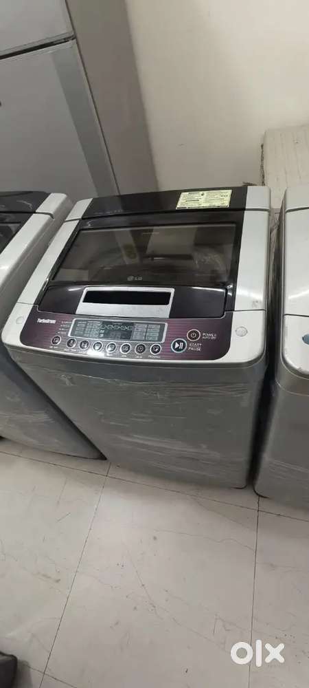 LG washing machine fully automatic top load with warranty 1 year old