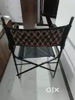 Foldable chair in black colour 1 piece very new condition