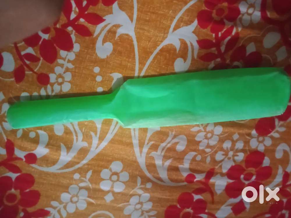Plastic bat with rubbers ball
