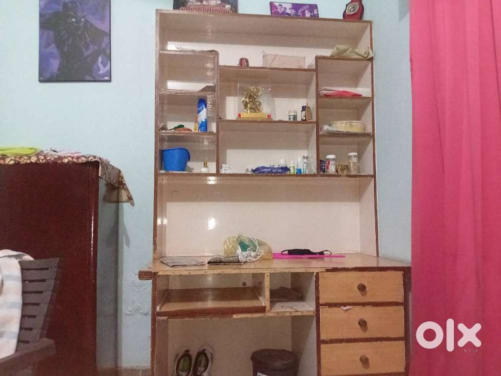 Computer table and book shelf racks.