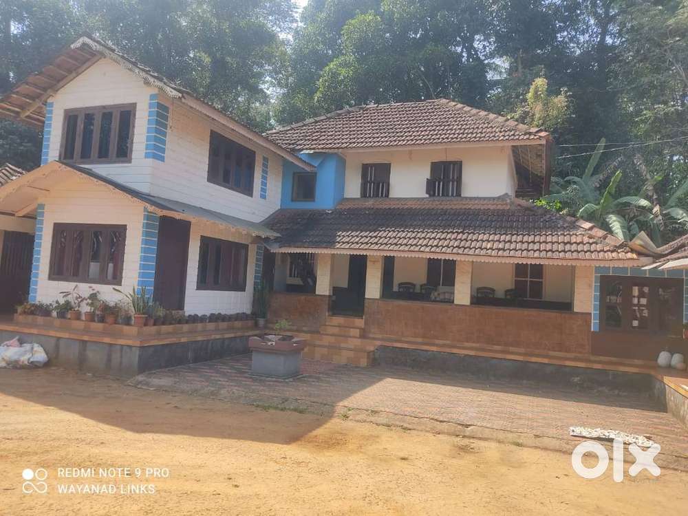 30-Acre Scenic Property with Traditional Illam for Sale in Kavumandam