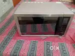 Unused bajaj 2504 ETC microwave 25 ltr