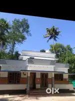 കൂറ്റുവേലി തെക്കുവശം NH 5002 bedroom bathroom കൂടിയ വീട് 33 ലക്ഷം