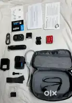GoPro Hero 12 Camera with accessories and kit.