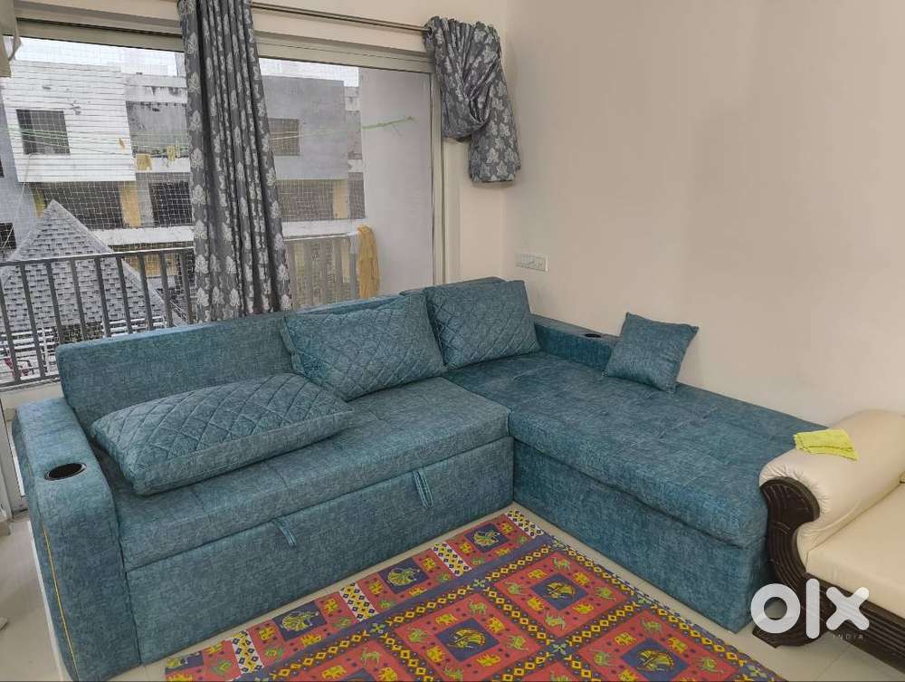 Sofa cum bed with cover