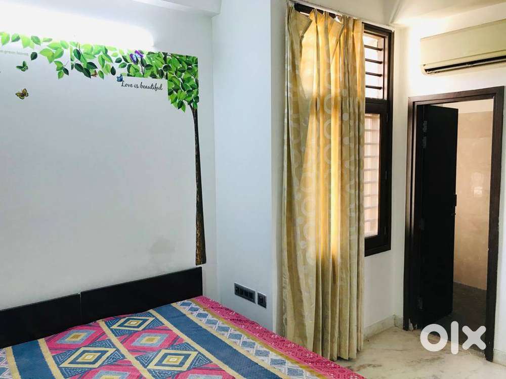 2bhk full furnished,gated green&safe society,AC fridge RO beds curtain