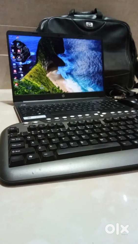HP laptop with keyboard, mouse and original hp laptop bag!!