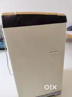 Videocon top load washing machine. In working condition with stand.