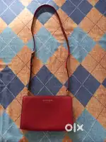 Michael Korrs ladies leather sling bag