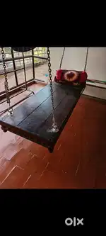 Old swing, wooden tepai, wooden chair