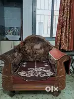 Wooden sofa in excellent condition.