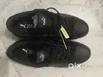 Selling Brand New Black Puma Shoes