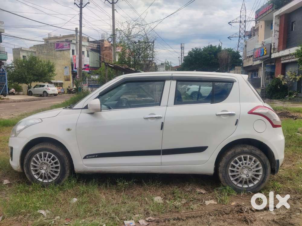 Maruti Suzuki Swift LXI Optional-O, 2016, Petrol