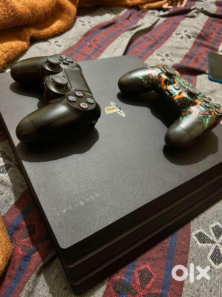 Sony PS4 PRO BRAND NEW CONDITION WITH 18 games