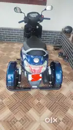 Extra wheel for disabled scooter