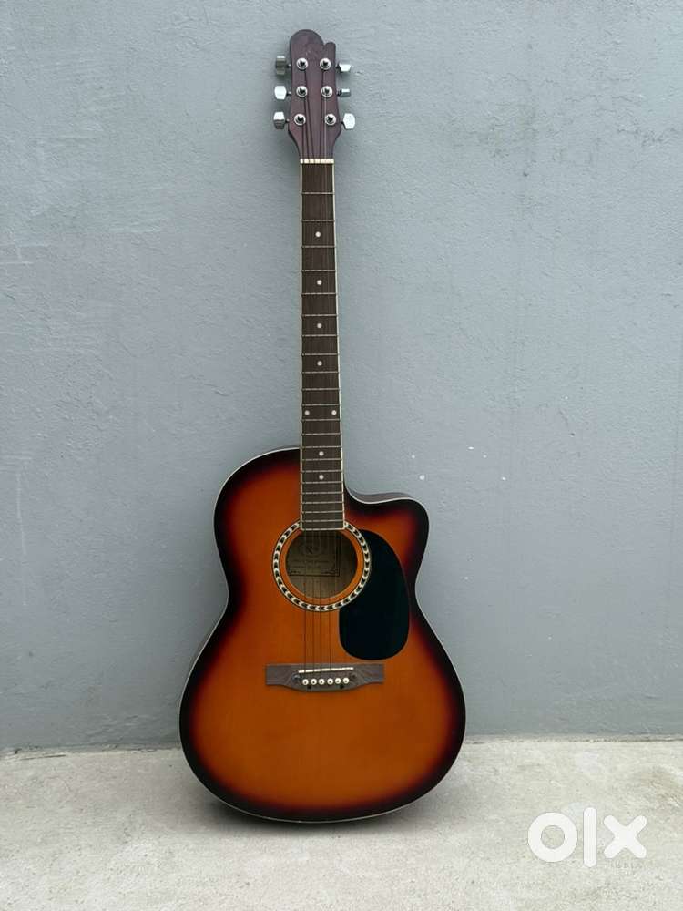 Guitar for Sale – 1 Year Old with Capo