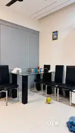 Glass top dining table with 4 chairs for sell