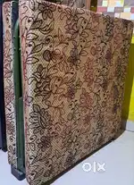 Folding cushion bed