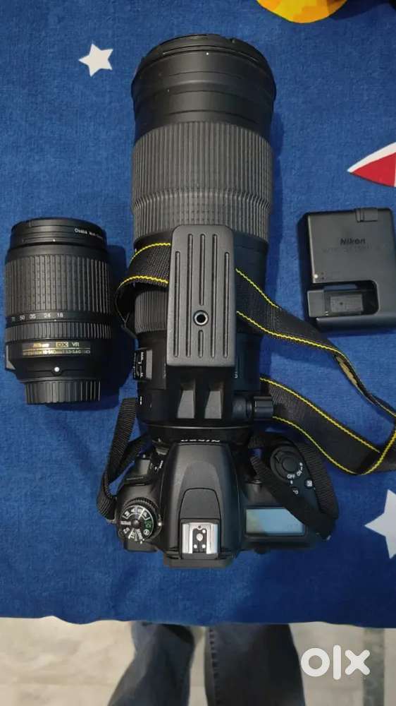 Nikon DSLR camera and telephoto lens