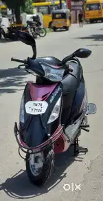 Tvs scooty streek 2013 model pink low km low usage exelent condition