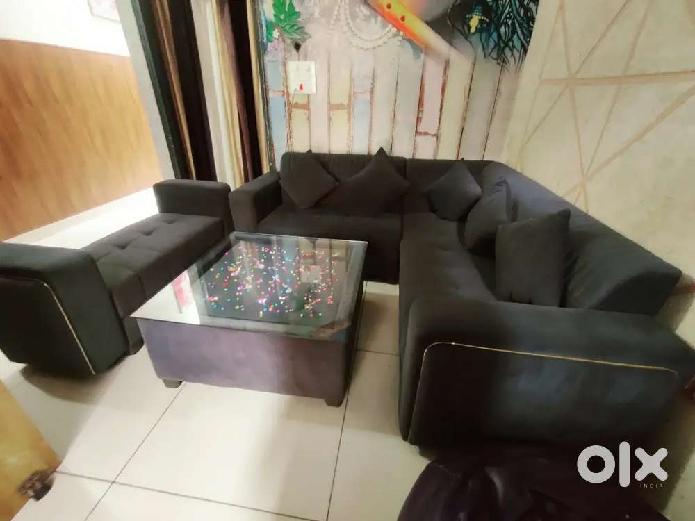 L Shape Seven seater Sofa with Glass Table