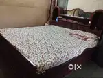 Bed with shelf and drawer
