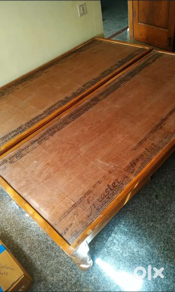 Two single cots with two single cotton mattress