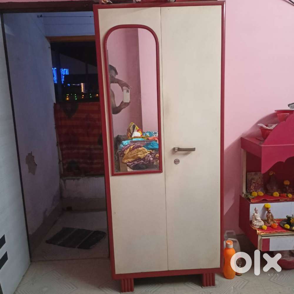 Red & White colour Steel Almira in super mint condition. No scratches.