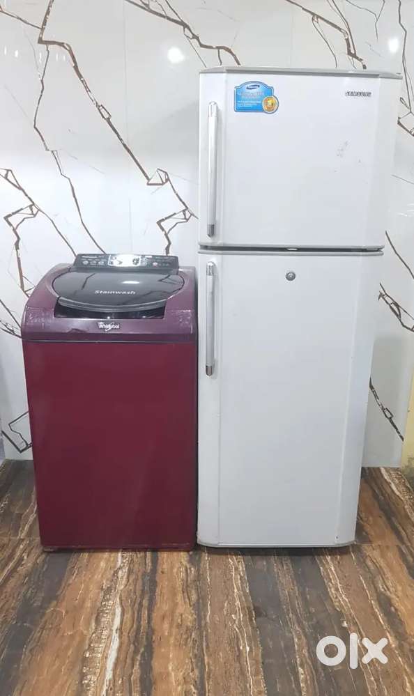 Samsung double door refrigerator and whirlpool top load washing machin