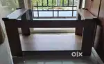 Coffee table in exotic teak finish