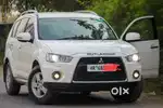 Automatic car Mitsubishi Outlander 4 by 4 2011 Petrol 98000 Km Driven