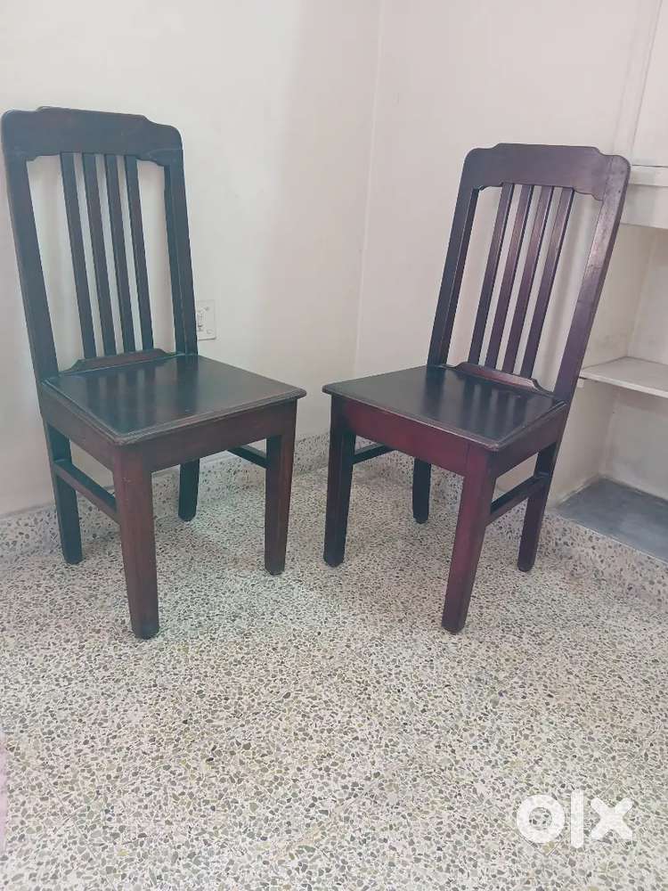 2 teak wood chairs