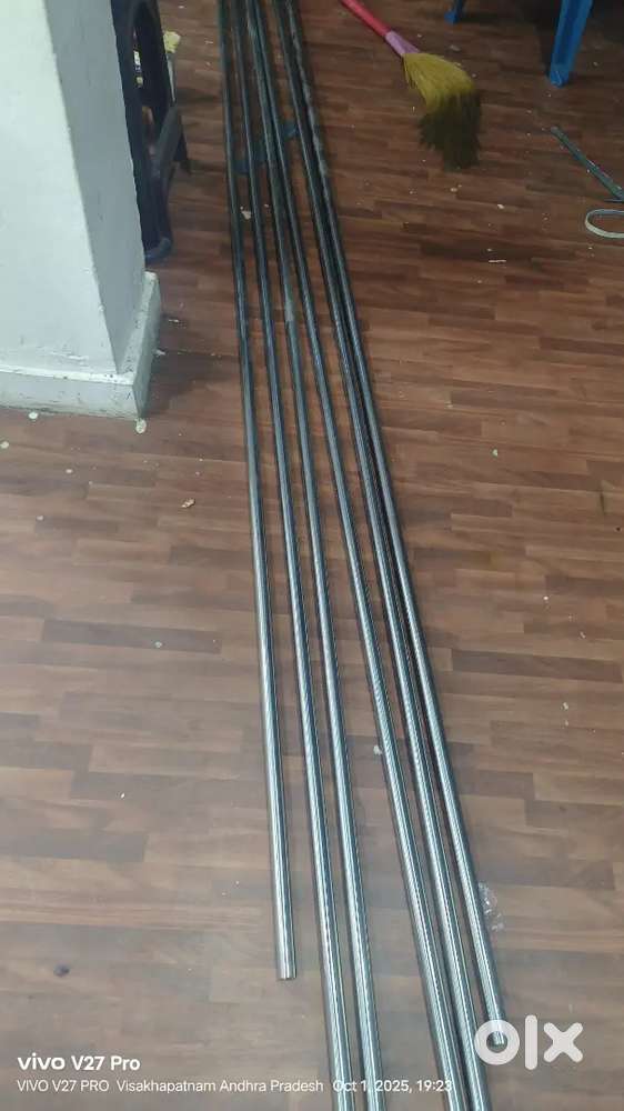 steel curtain rods.. full lengtn.