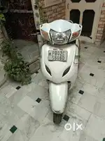 Honda Activa 3G white color , 2 keys ,new tyres , very less used