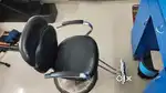 Hair cutting chair and facial bed