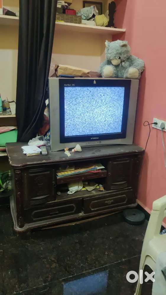 Tv with woofer and table working good condition