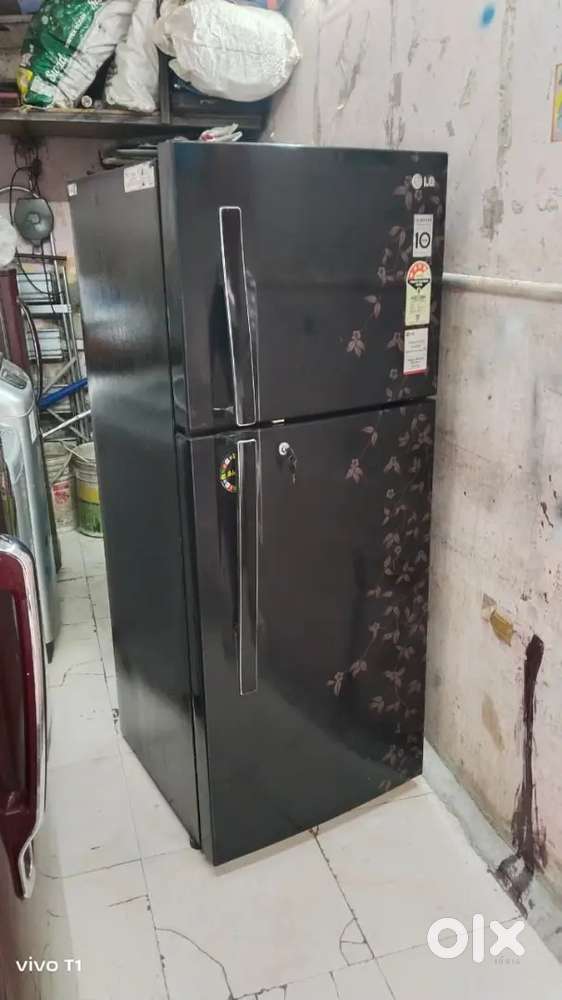 Washing machine & single and double door fridge in different colours