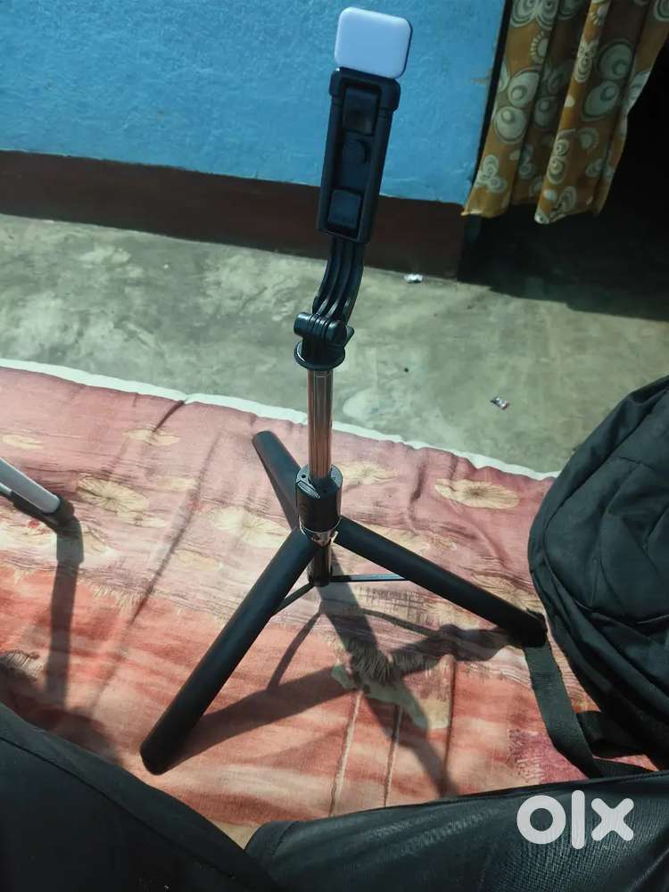 Best trypod and gible stick with flash light and bluetooth