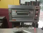 Oven, fridge , wooden counter , LG fridge