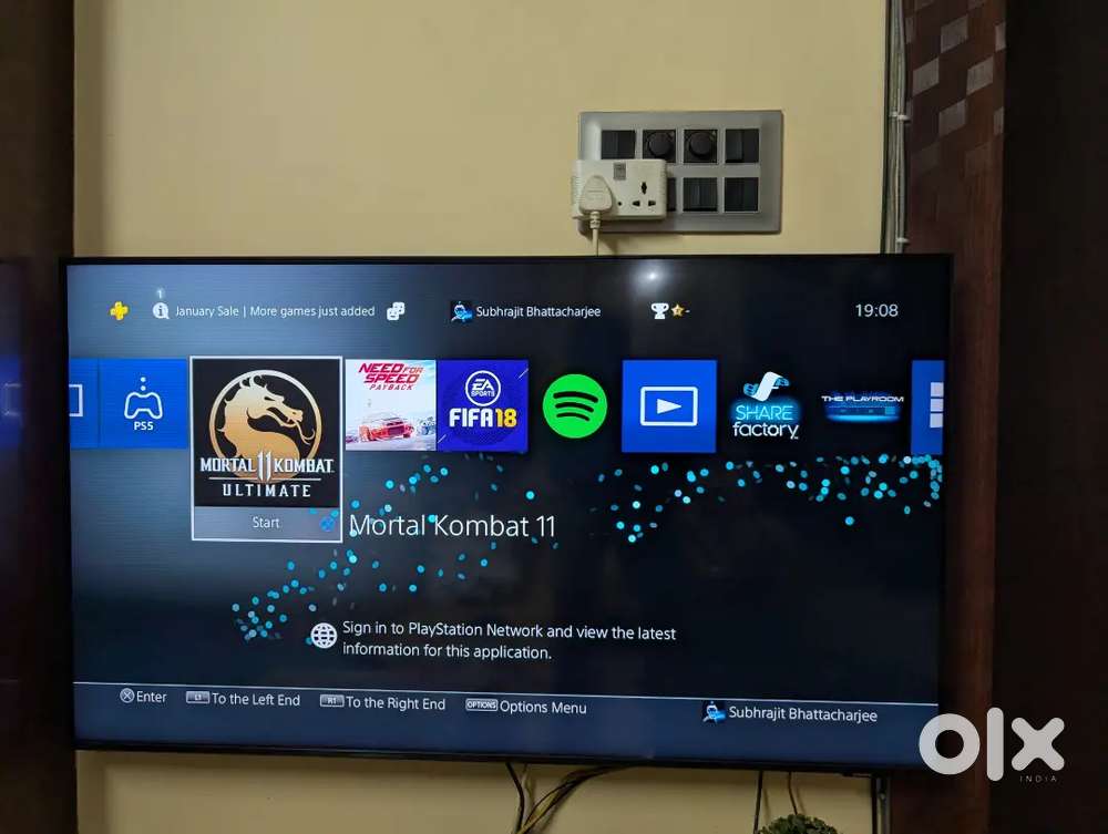 PS4 Slim with 2 Controllers and 8 Games