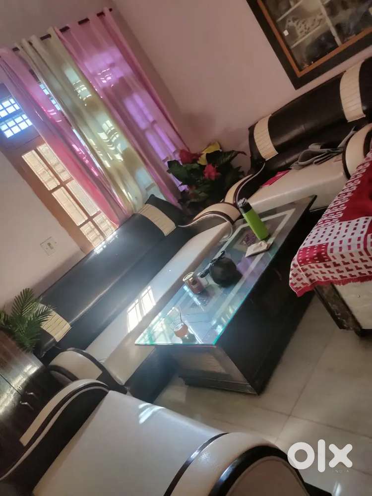 7 seater sofa with big box and glass table