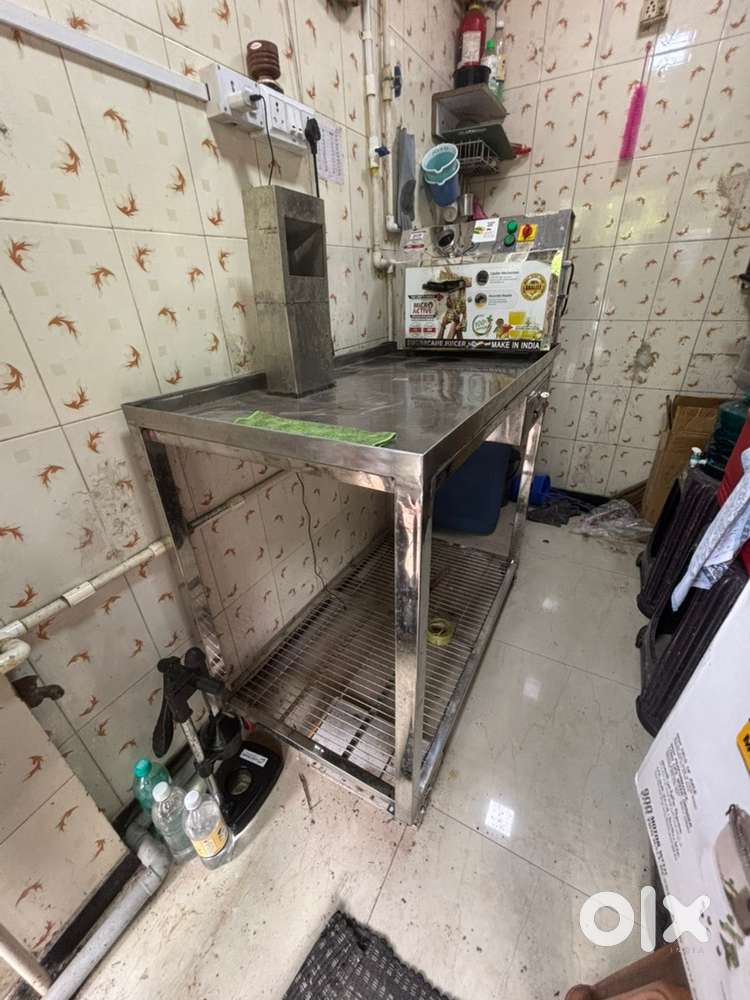 Stainess Steel table 2ft x 4 ft with 1 plastic stool and 6 chairs free