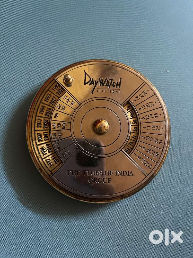 Antique brass calendar