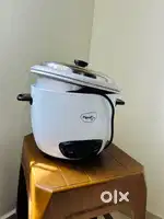 Electric rice cooker from pigeon